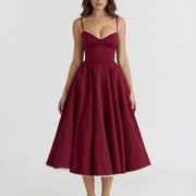 Vestido midi con corsé y falda amplia