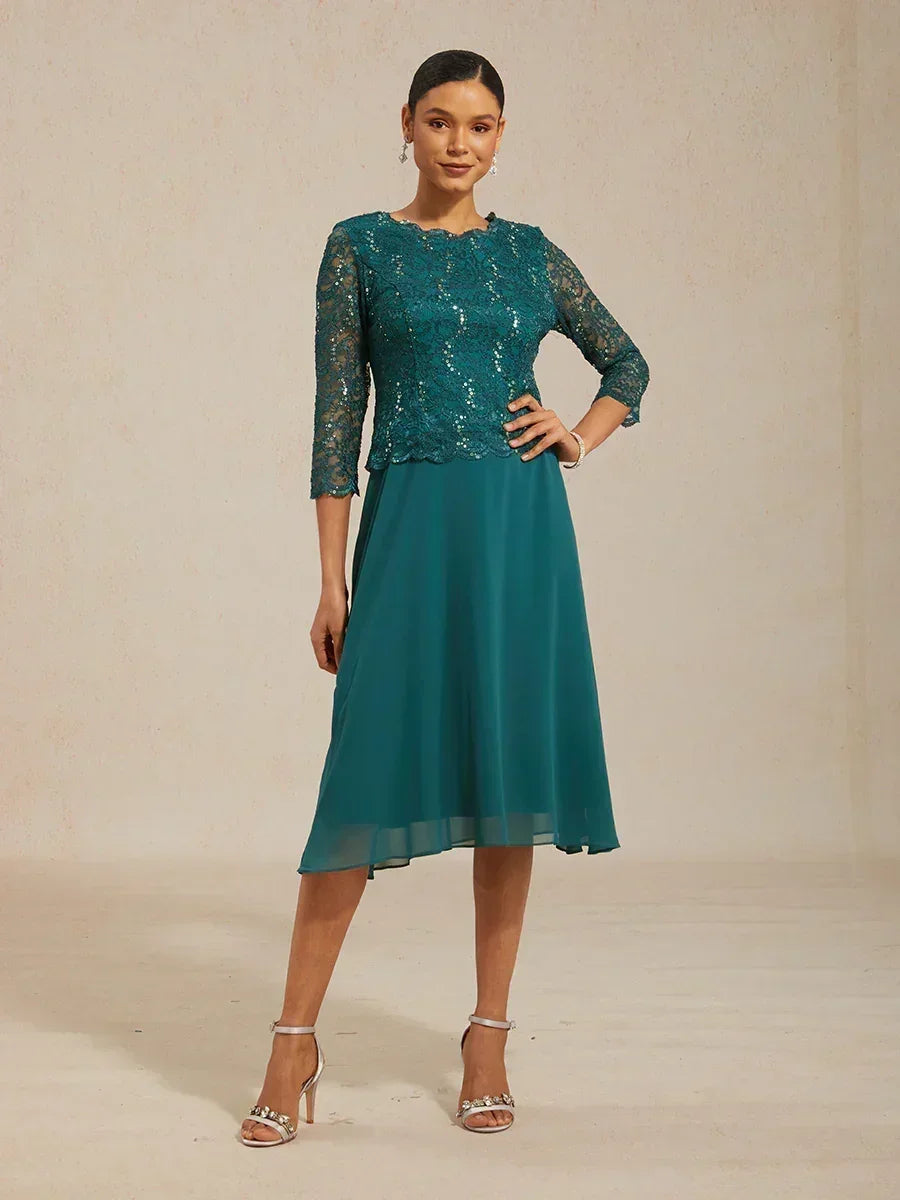 Vestido midi con encaje y manga tres cuartos