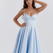 Vestido midi con corsé y falda amplia