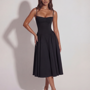 Vestido midi con corsé y falda fluida