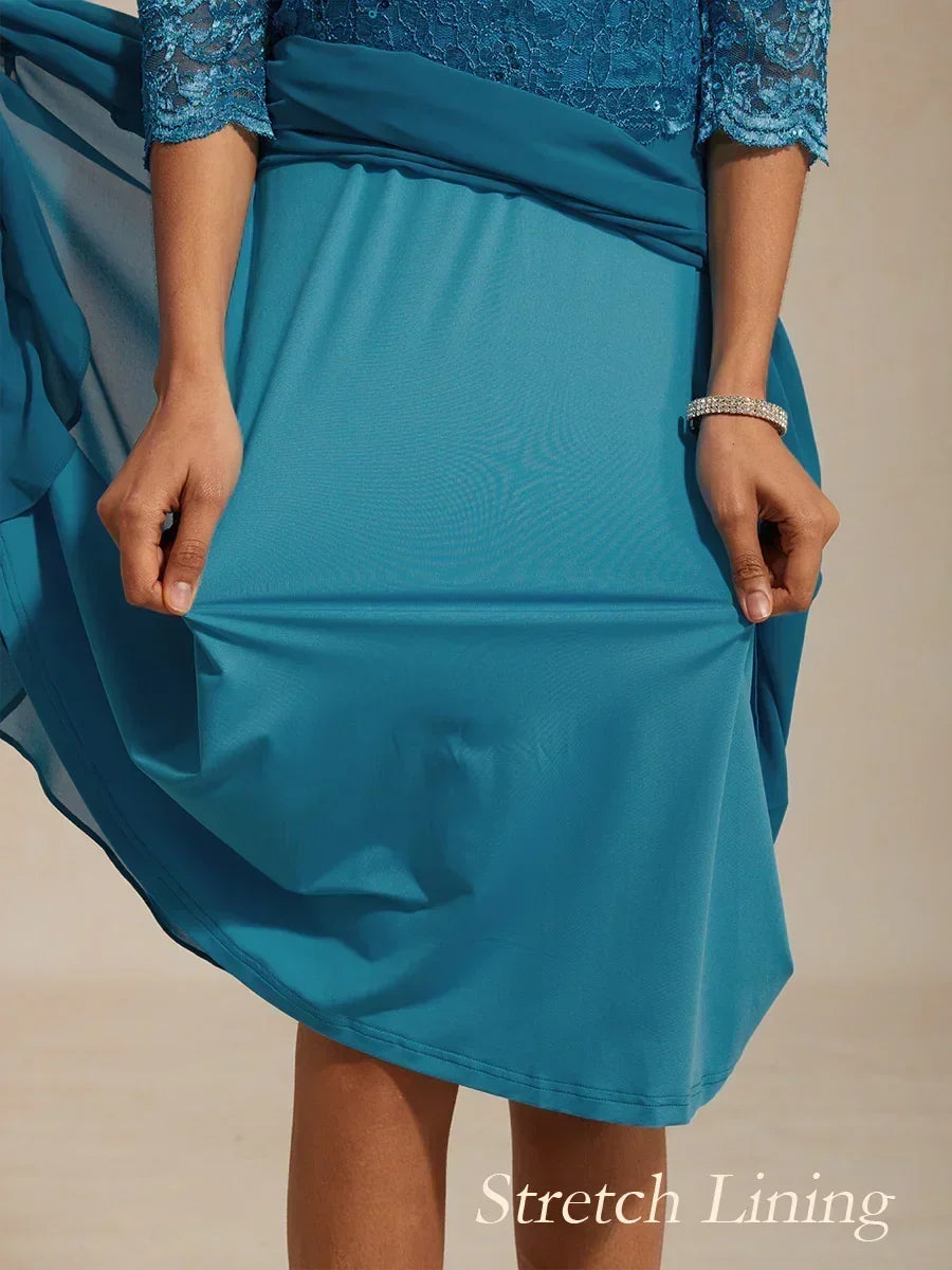 Vestido midi con encaje y manga tres cuartos