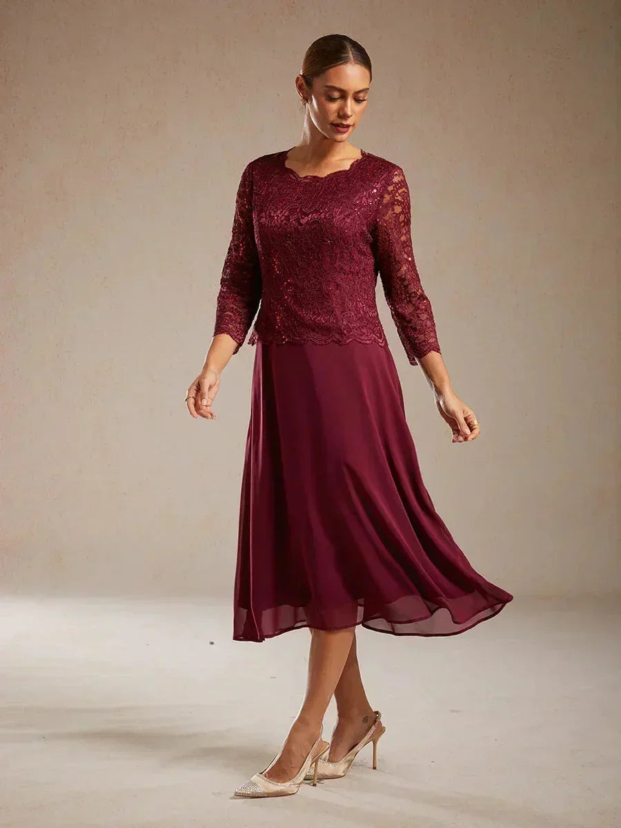 Vestido midi con encaje y manga tres cuartos
