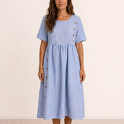 Vestido midi fluido con botones