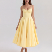 Vestido midi con corsé y falda amplia