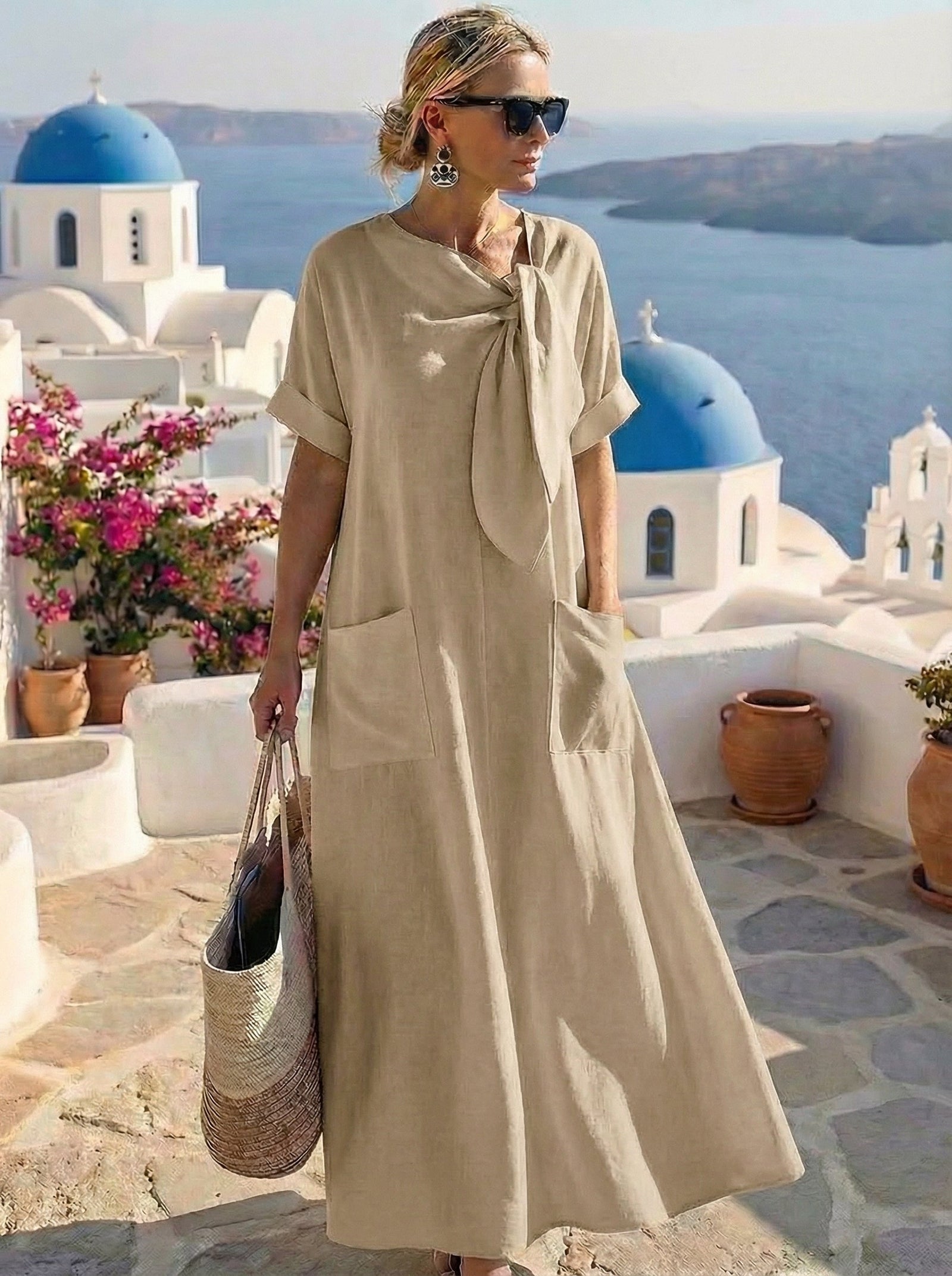 Vestido midi fluido con lazada al cuello
