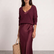 Vestido midi de satén con jersey incluido