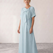 Vestido midi fluido con lazada al cuello