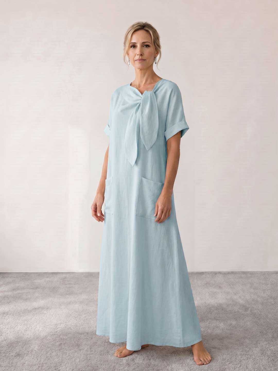 Vestido midi fluido con lazada al cuello