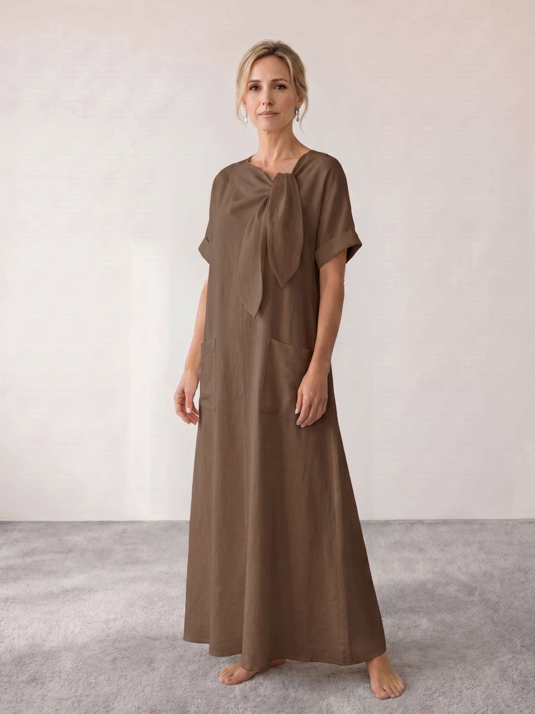 Vestido midi fluido con lazada al cuello