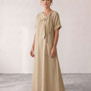 Vestido midi fluido con lazada al cuello