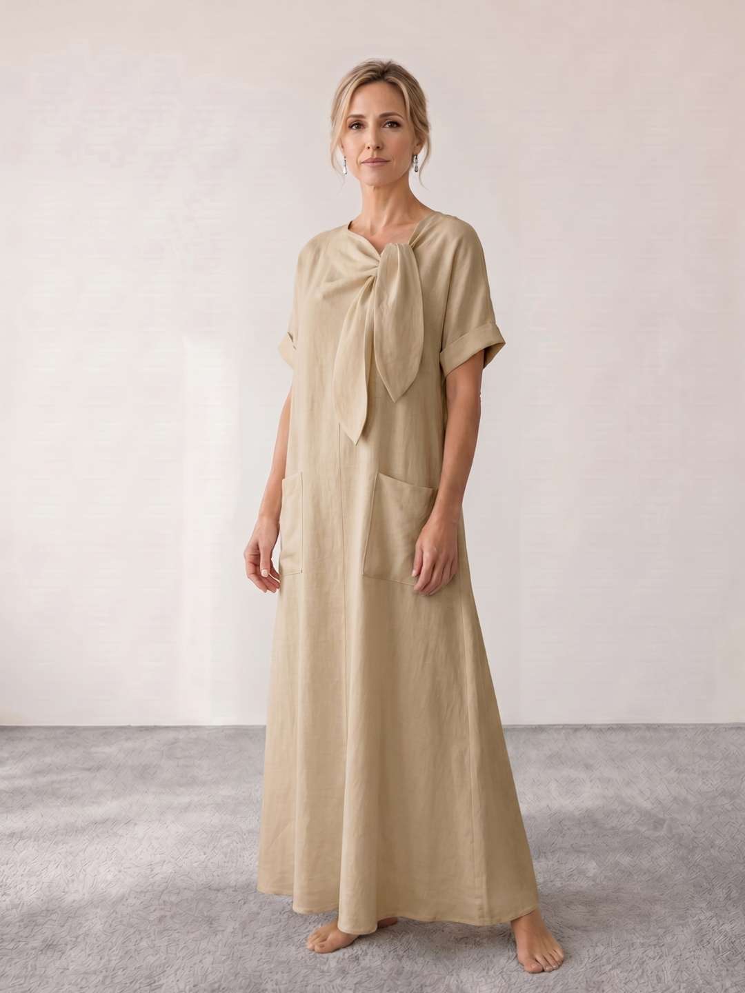 Vestido midi fluido con lazada al cuello
