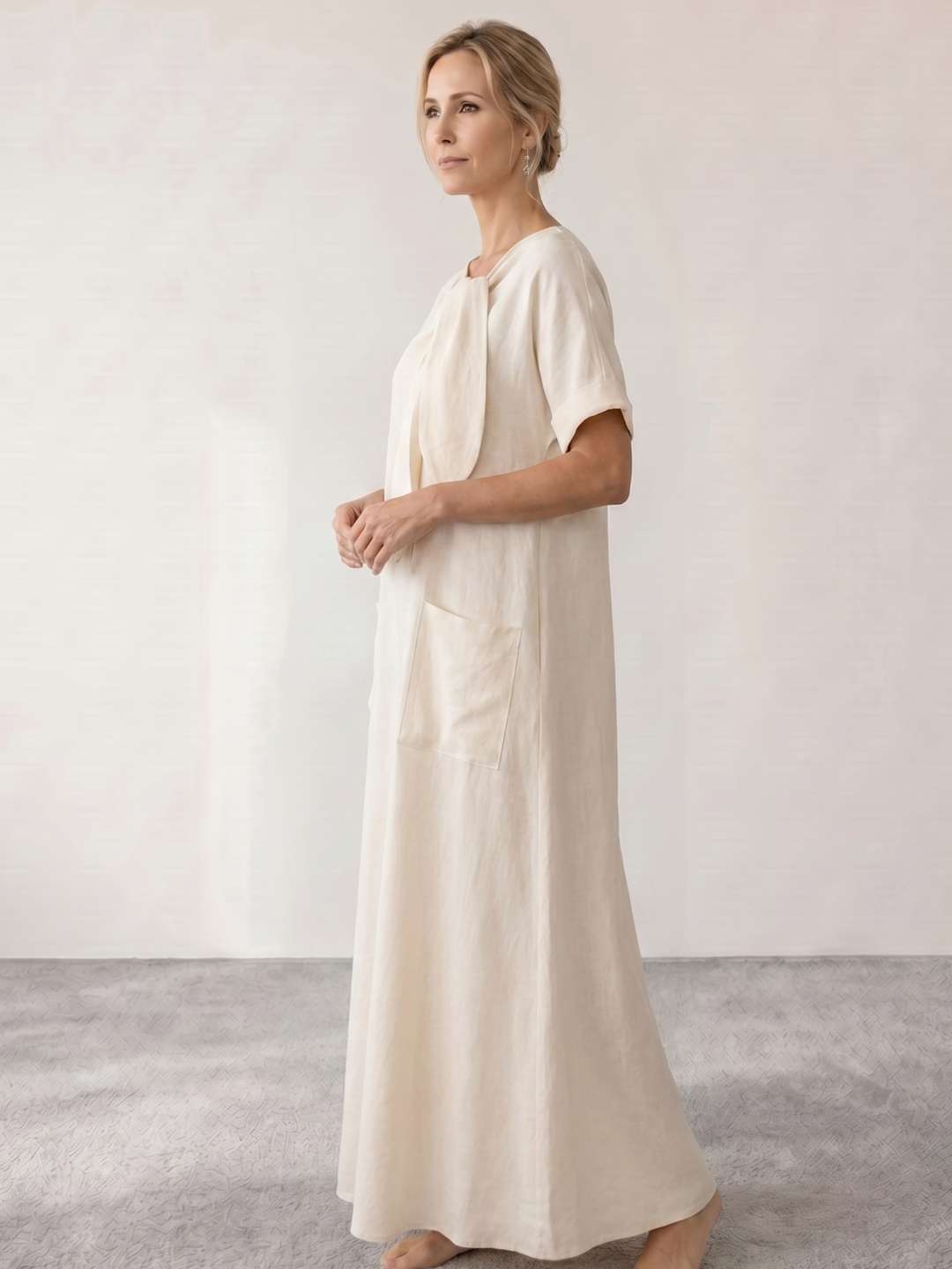 Vestido midi fluido con lazada al cuello