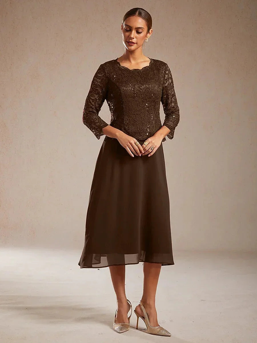 Vestido midi con encaje y manga tres cuartos