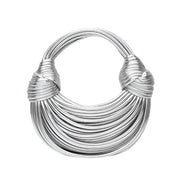 Bolso rígido dorado de diseño escultural